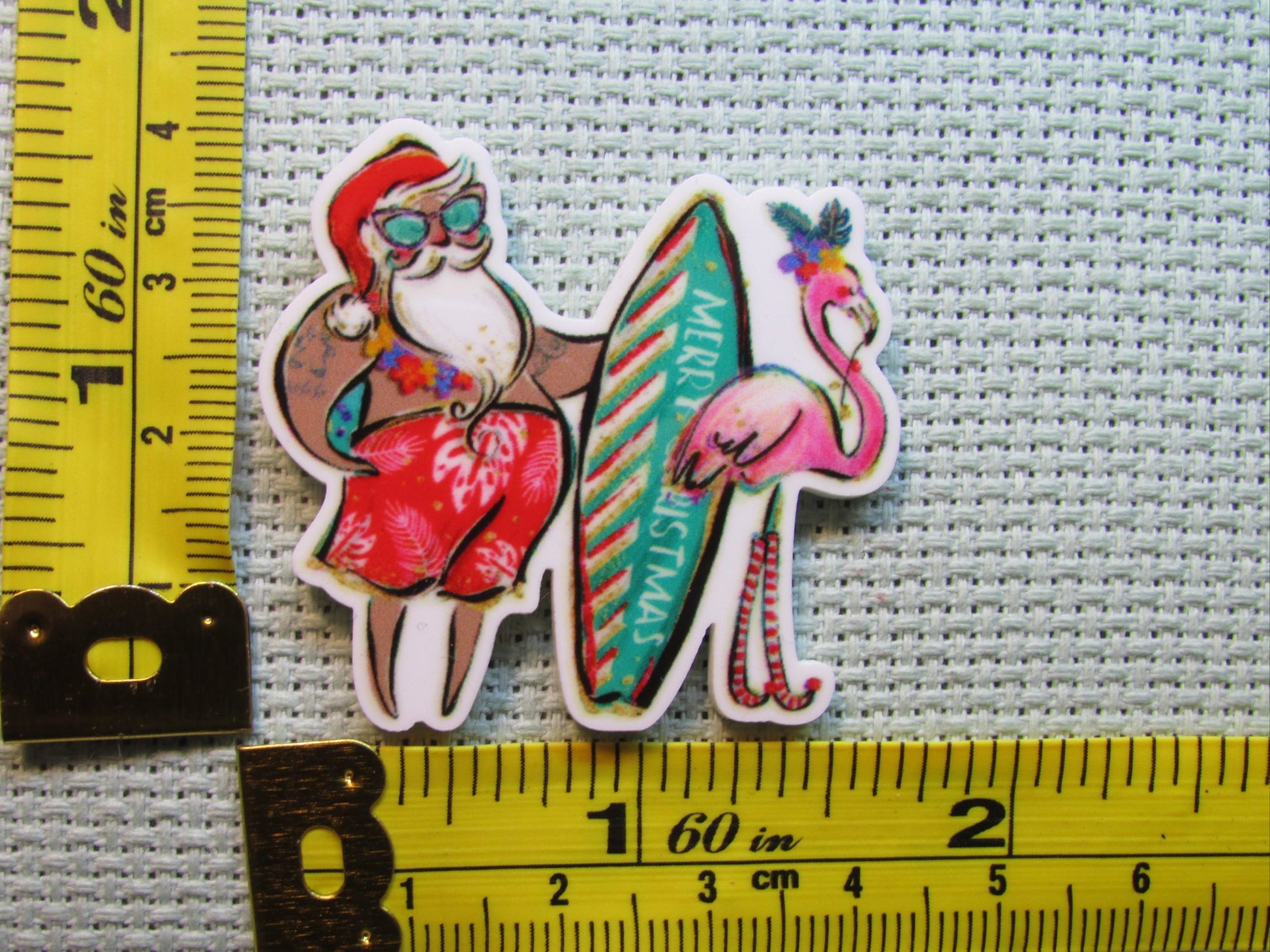 Third view of the Surfing Santa with a Flamingo Needle Minder