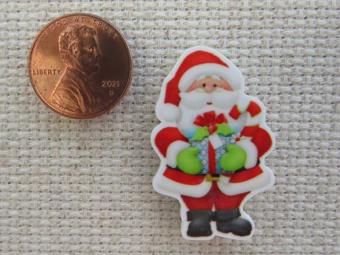 First view of Santa with a Present Needle Minder,.