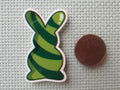 Second view of the Green Swirl Bunny Needle Minder