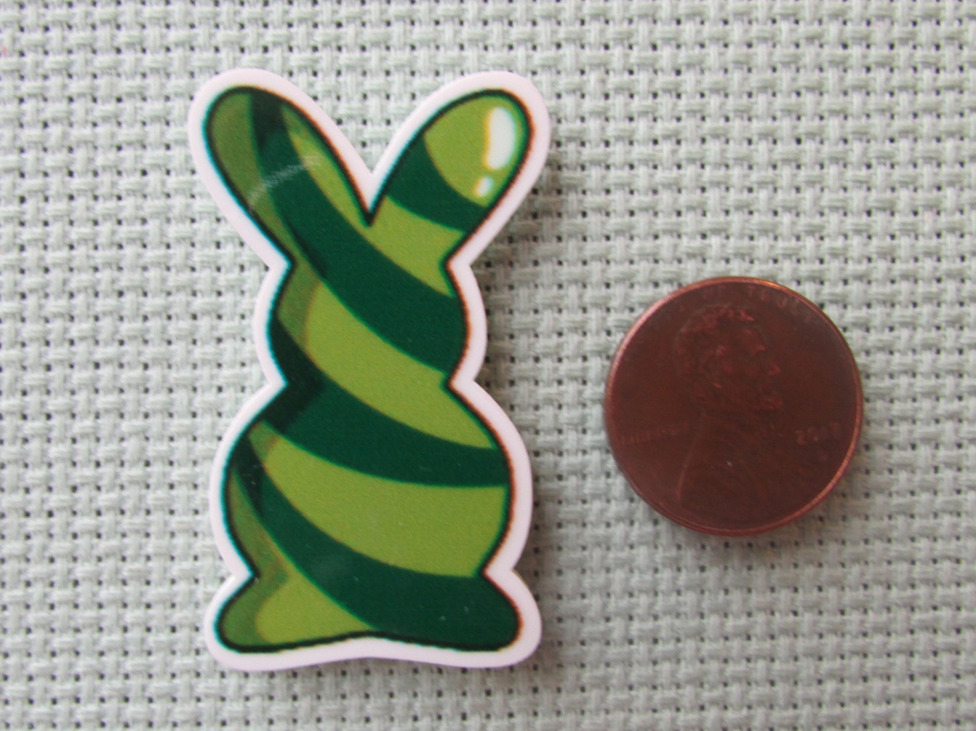 Second view of the Green Swirl Bunny Needle Minder