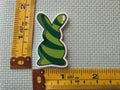 Third view of the Green Swirl Bunny Needle Minder