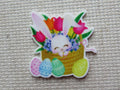First view of Bunny in a Tulip Basket Needle Minder.