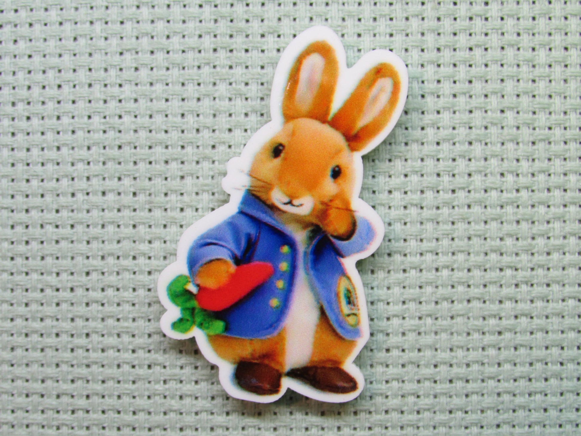 First view of the Easter Bunny Wearing a Coat Needle Minder