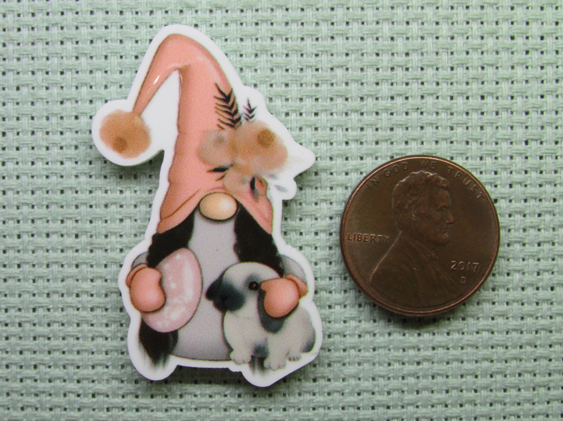 Second view of the Easter Gnome Holding a Bunny and an Egg Needle Minder