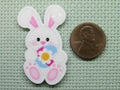 Second view of the Easter Bunny Holding a Pretty Flower Easter Egg Needle Minder