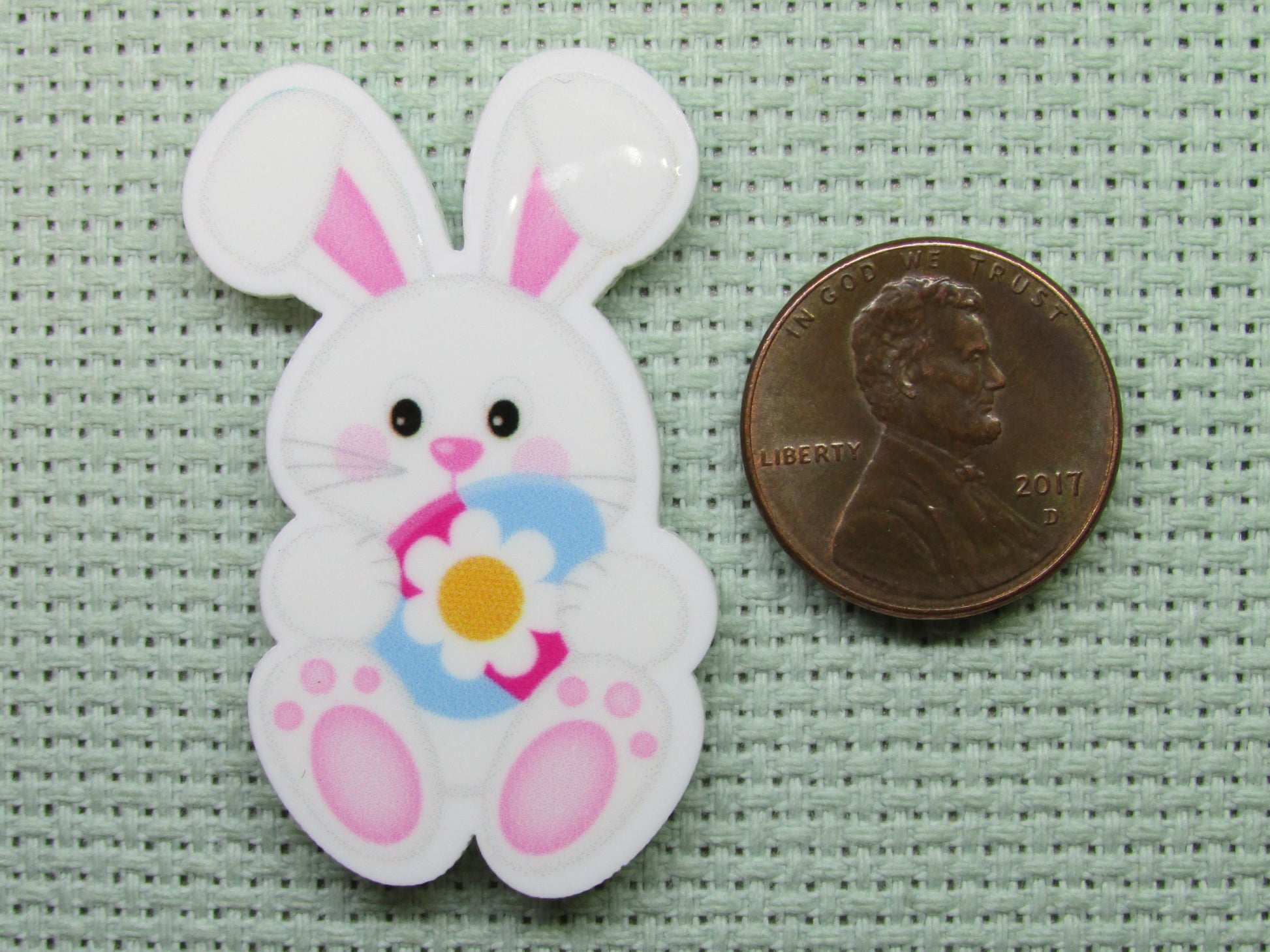 Second view of the Easter Bunny Holding a Pretty Flower Easter Egg Needle Minder
