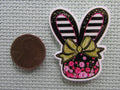 Second view of the Black and White Stripped Floral Bunny Head Needle Minder