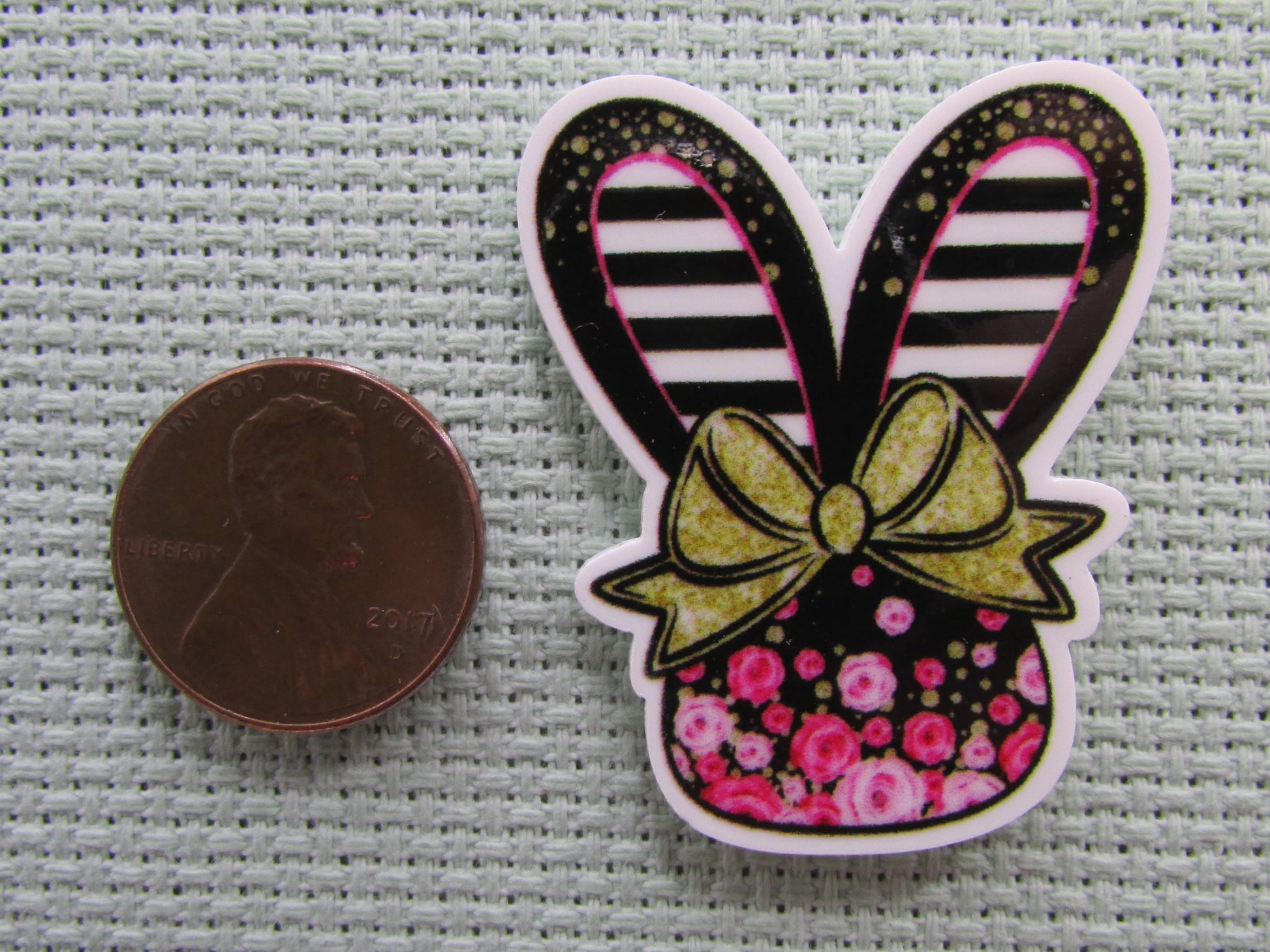 Second view of the Black and White Stripped Floral Bunny Head Needle Minder