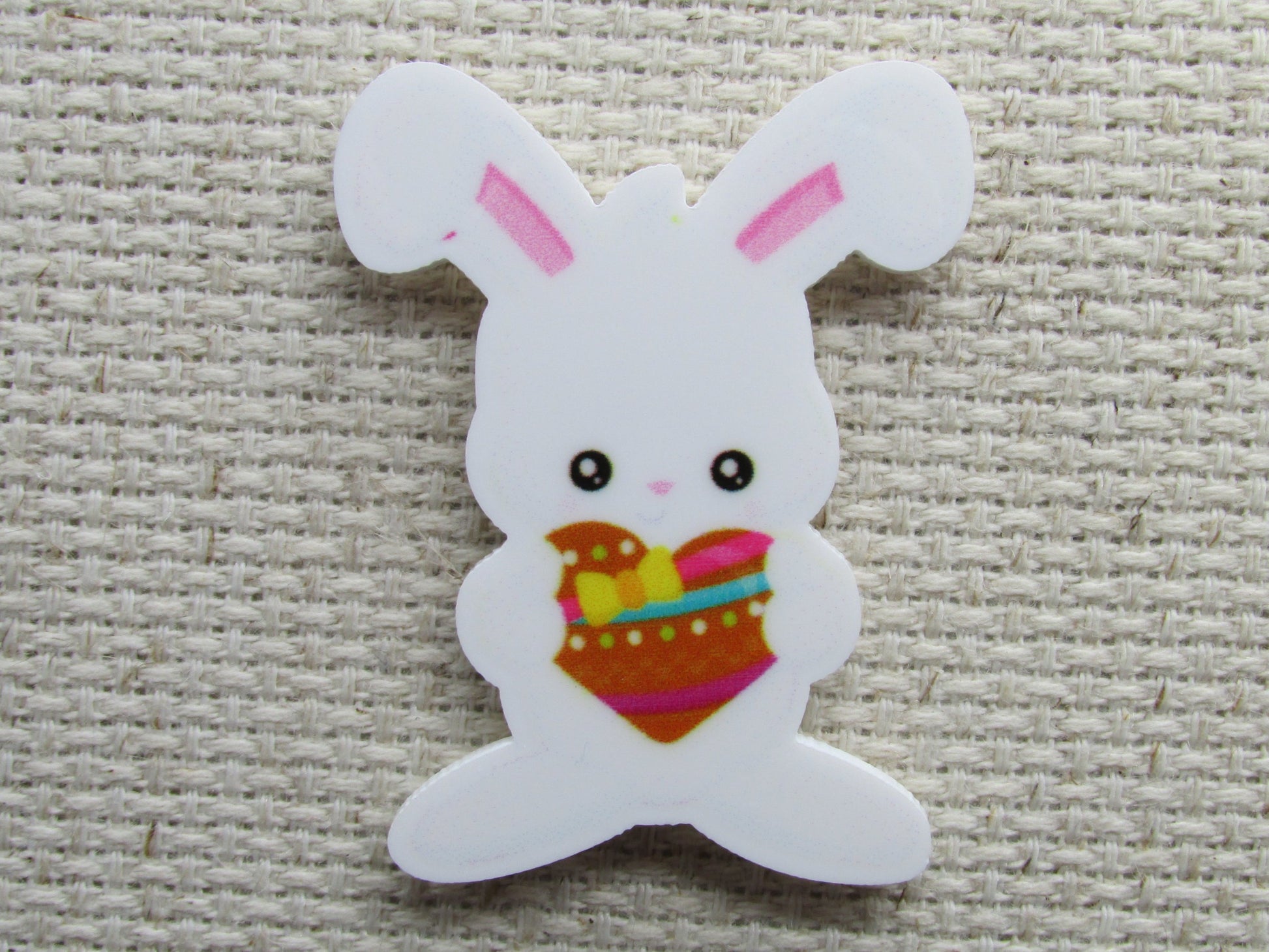 First view of the Easter Bunny Holding a Heart Needle Minder