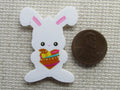Second view of the Easter Bunny Holding a Heart Needle Minder