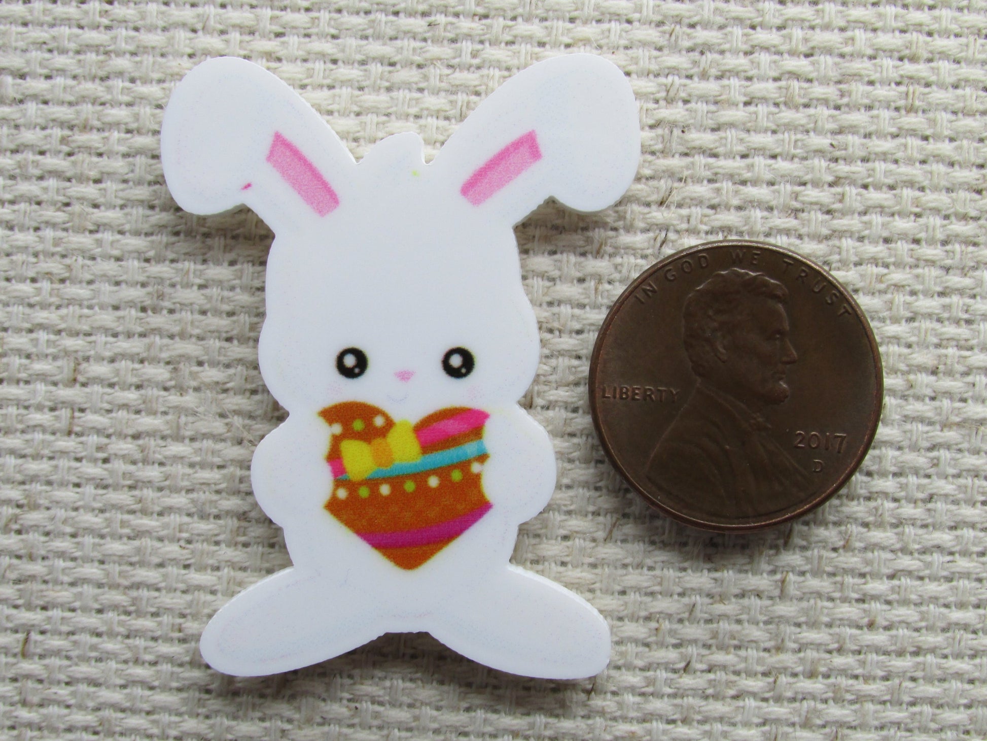 Second view of the Easter Bunny Holding a Heart Needle Minder