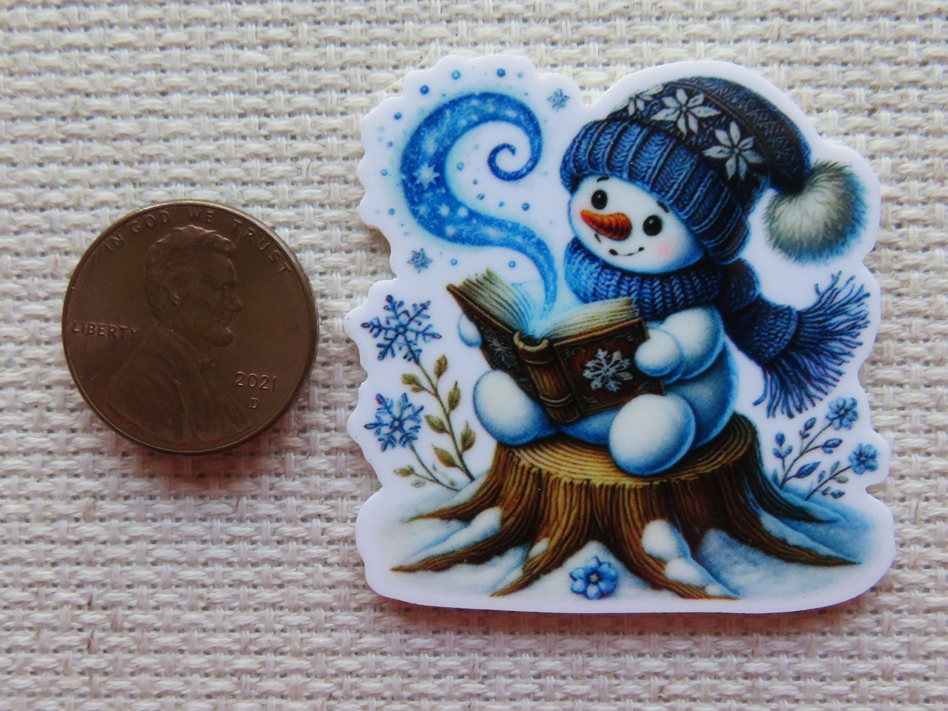 Second view of Blue Reading Snowman Needle Minder.