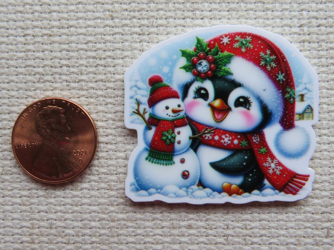 First view of Christmas Penguin with a Snowman Needle Minder.
