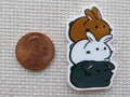 Second view of A Stack of Bunnies Needle Minder/
