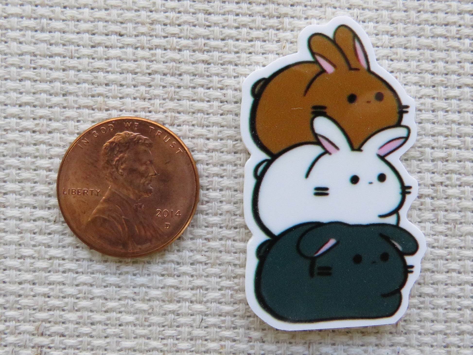 Second view of A Stack of Bunnies Needle Minder/