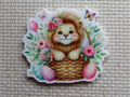 First view of Lion in an Easter Basket Needle Minder.
