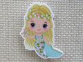 First view of Blond hair, blue tailed mermaid with a starfish minder.